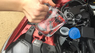 Mazda CX-5 long-term test review - windscreen washer top-up