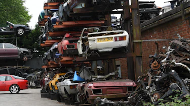 Rusty pile of cars