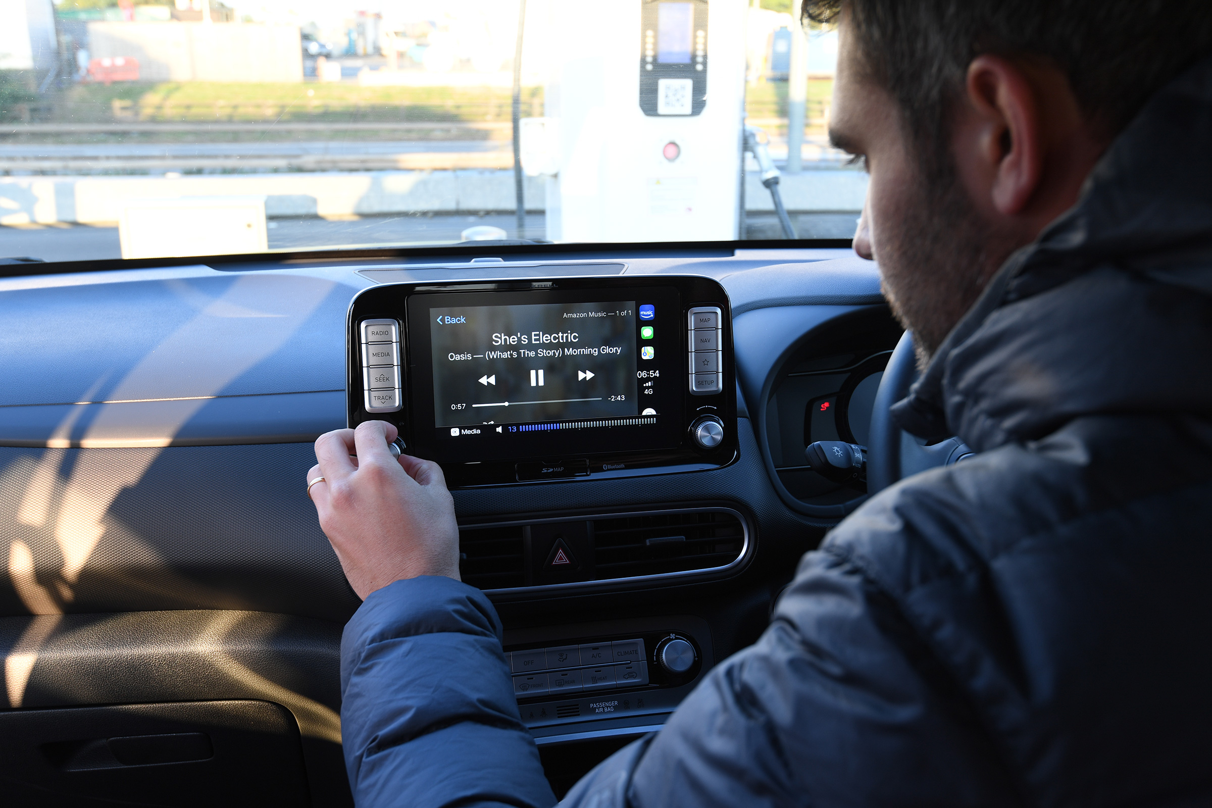 Richard Ingram stares at an infotainment screen