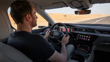 Audi e-tron driving inside