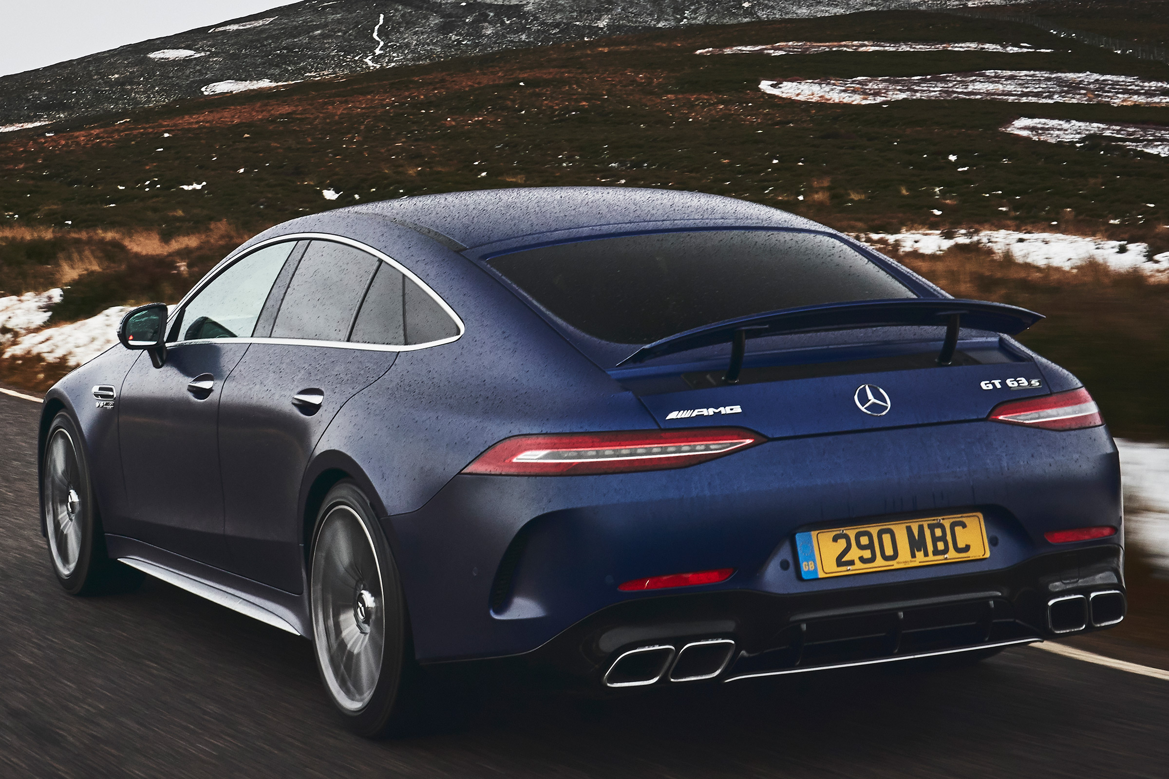 mercedes-amg gt 4-door tracking rear quarter