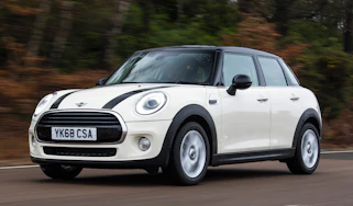 mini cooper classic 5-door tracking front quarter