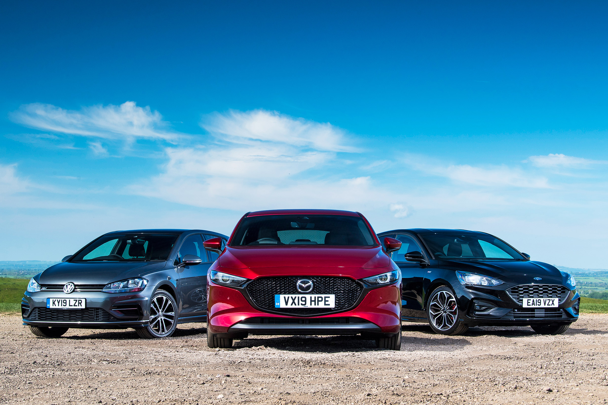 Mazda 3 vs Ford Focus vs Volkswagen Golf - head-to-head