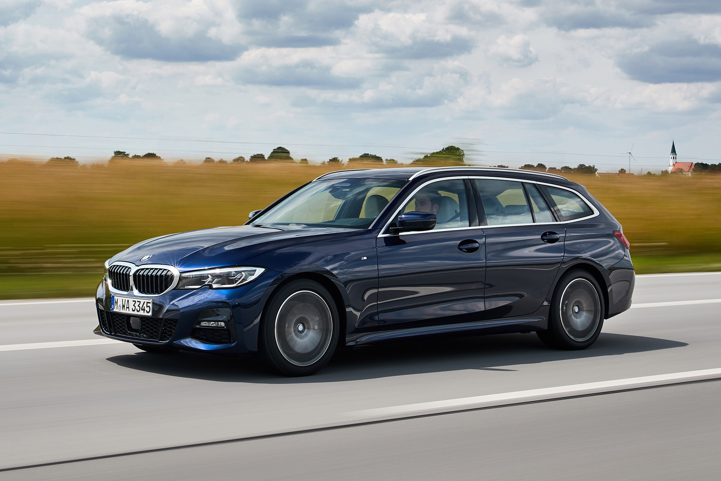 BMW 3 Series Touring - front/side