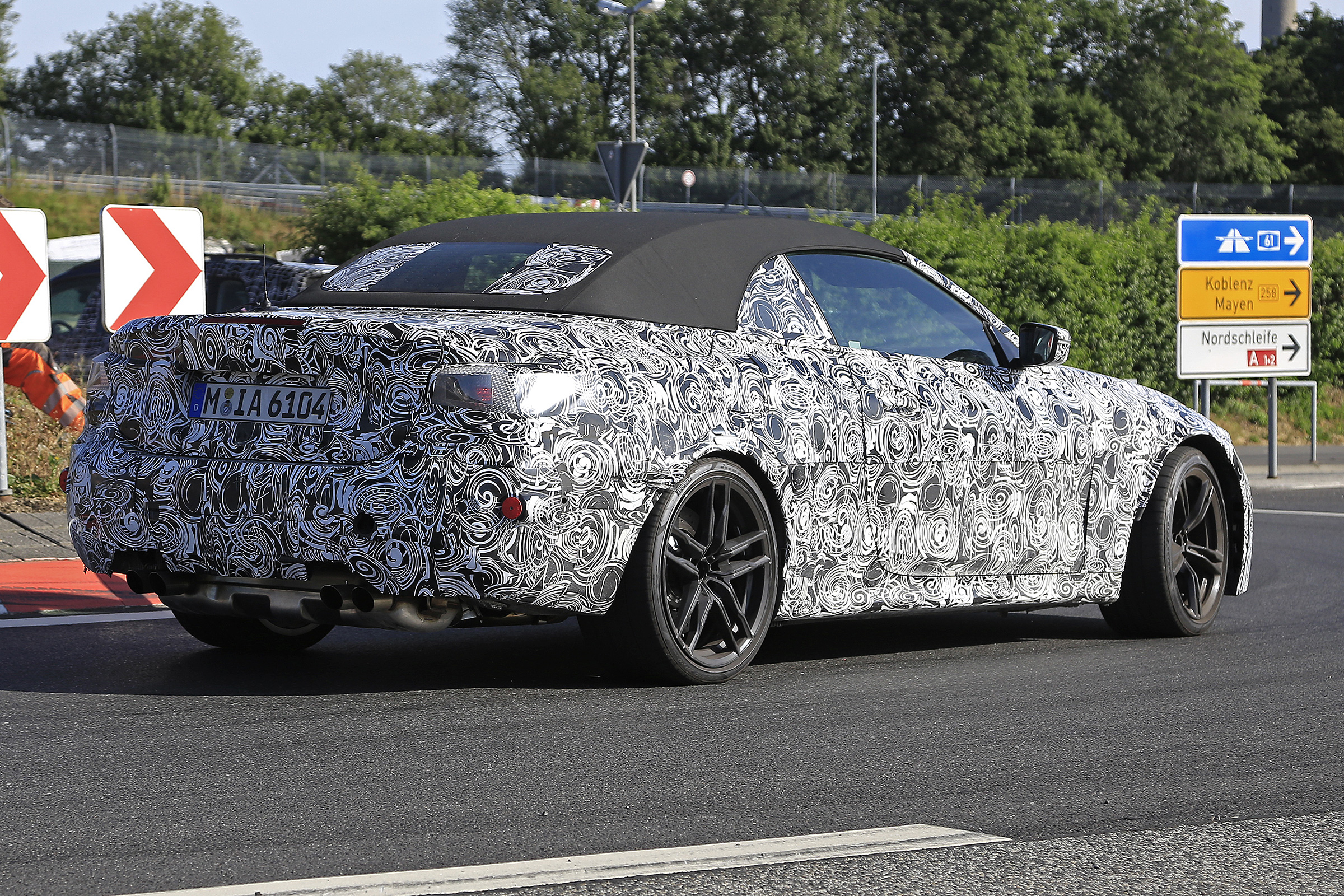 BMW M4 Convertible spied - rear 3/4 tracking