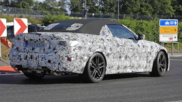 BMW M4 Convertible spied - rear 3/4 tracking