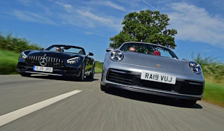 Porsche 911 Cabriolet vs Mercedes-AMG GT Roadster - header