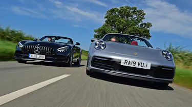 Porsche 911 Cabriolet vs Mercedes-AMG GT Roadster - header