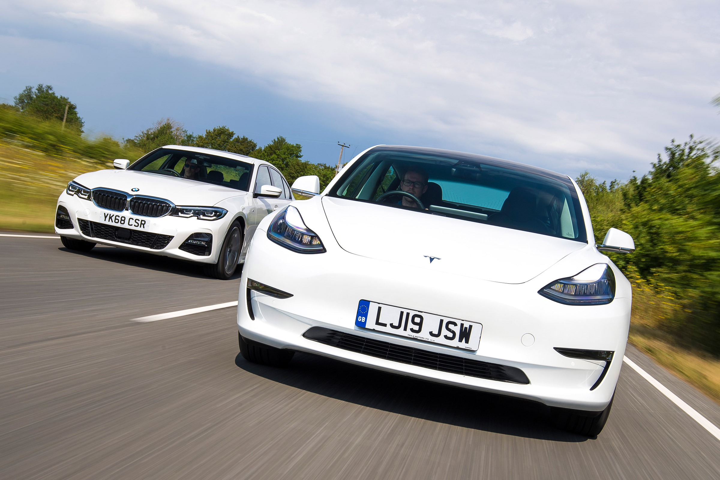 Tesla Model 3 vs BMW 3 Series - header