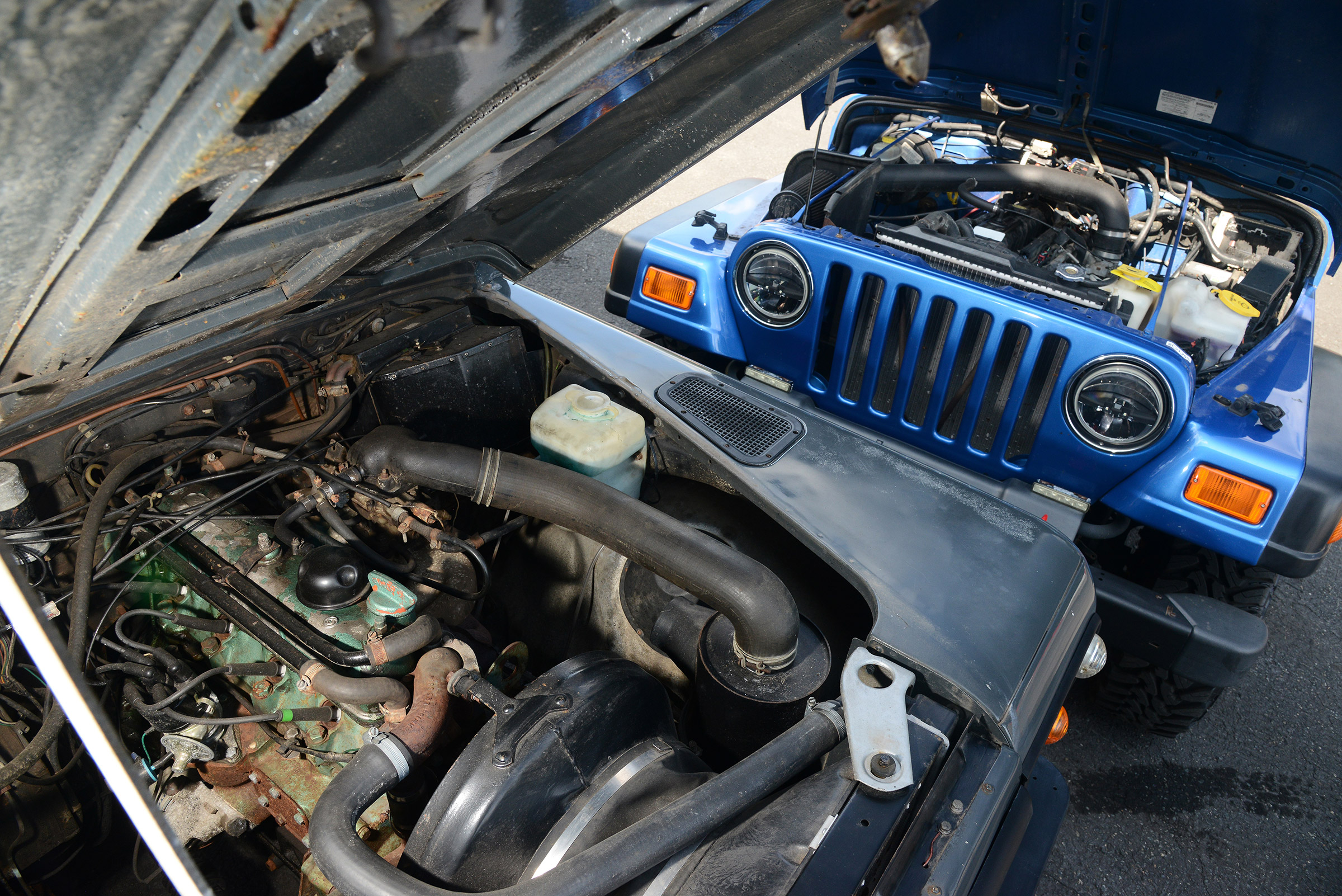 Land Rover Defender vs Jeep Wrangler - modern classics engines