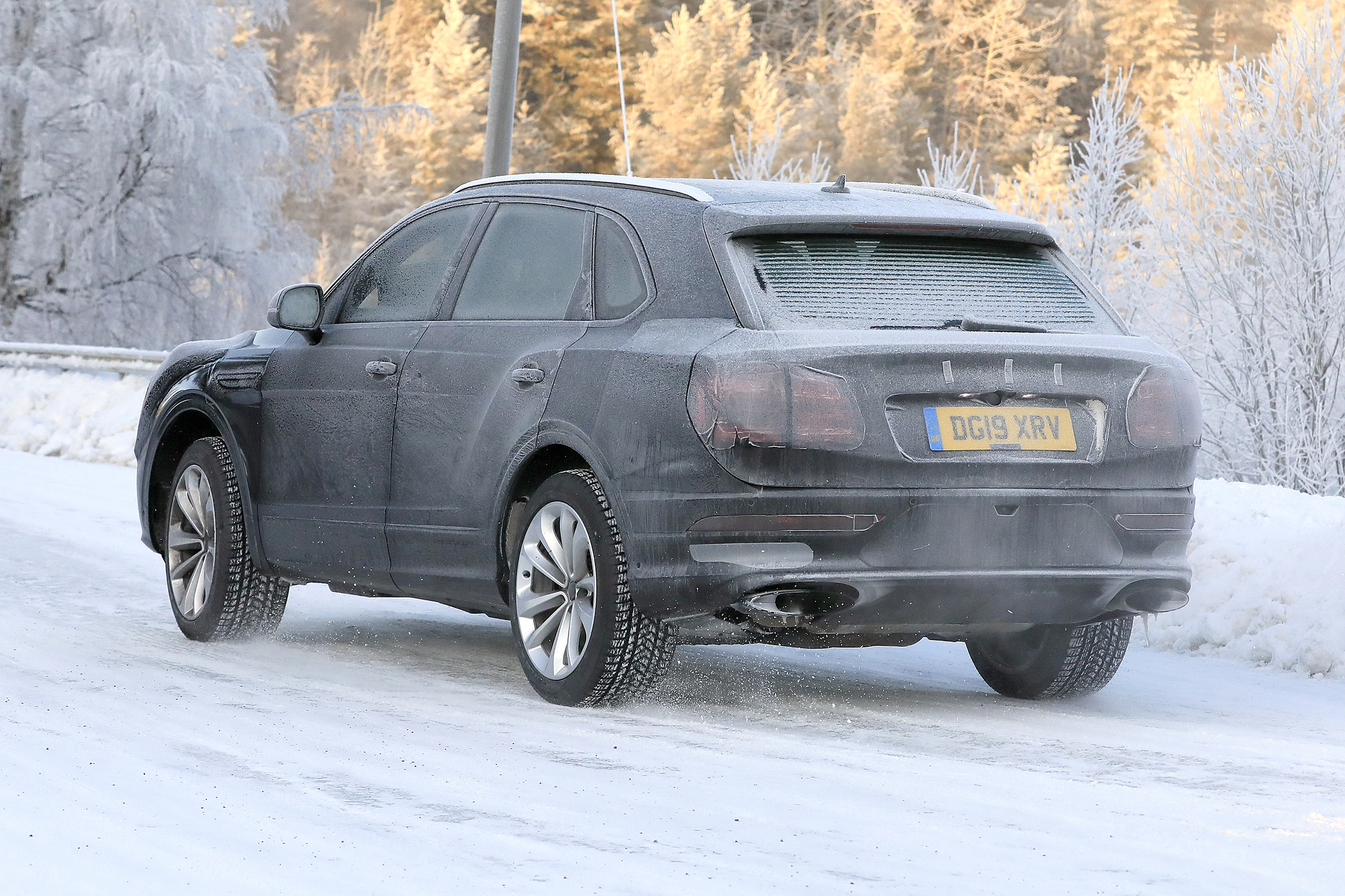 Bentley Bentayga - spies - rear 3/4 tracking