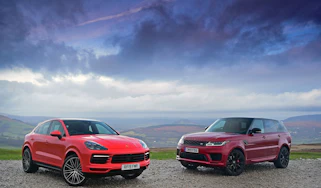 Porsche Cayenne Coupe vs Range Rover HST - twin test