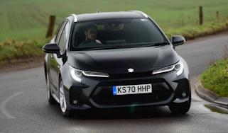 Suzuki Swace - front cornering