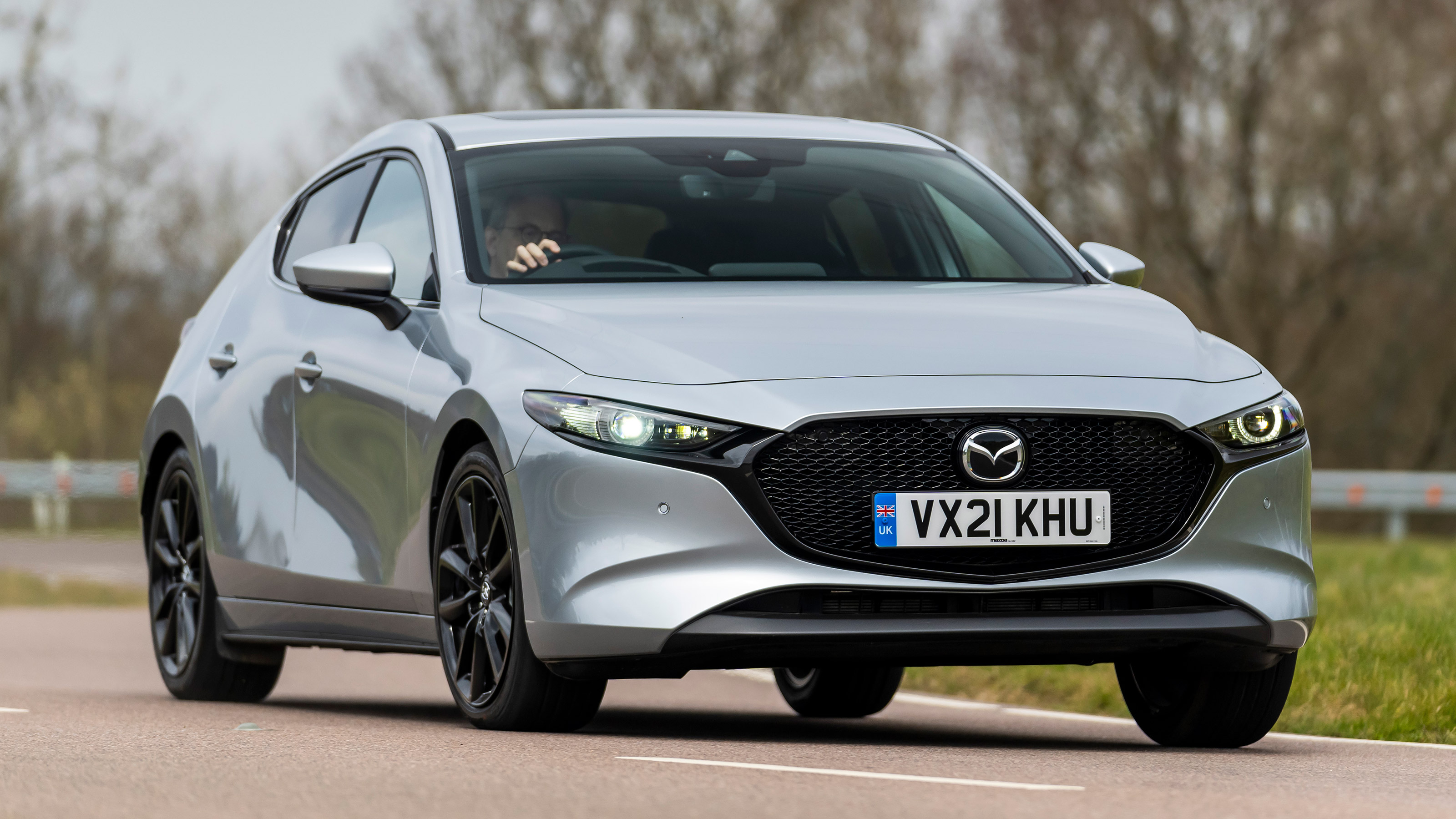 Mazda 3 e-SkyActiv X - front action