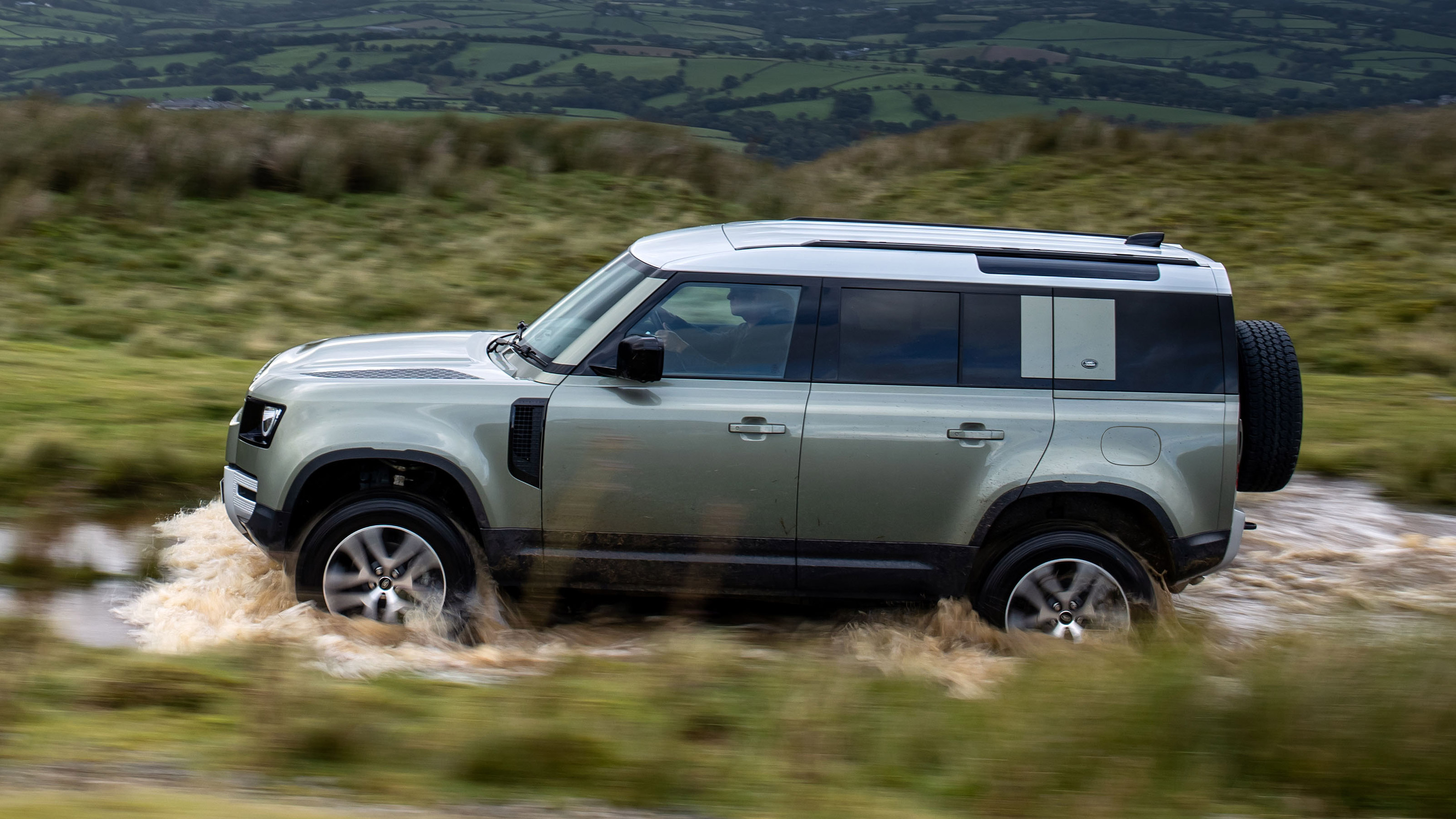 Land Rover Defender P400e PHEV - side off-road