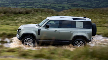 Land Rover Defender P400e PHEV - side off-road