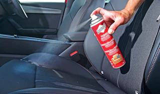 Fabric protector test - spraying a seat