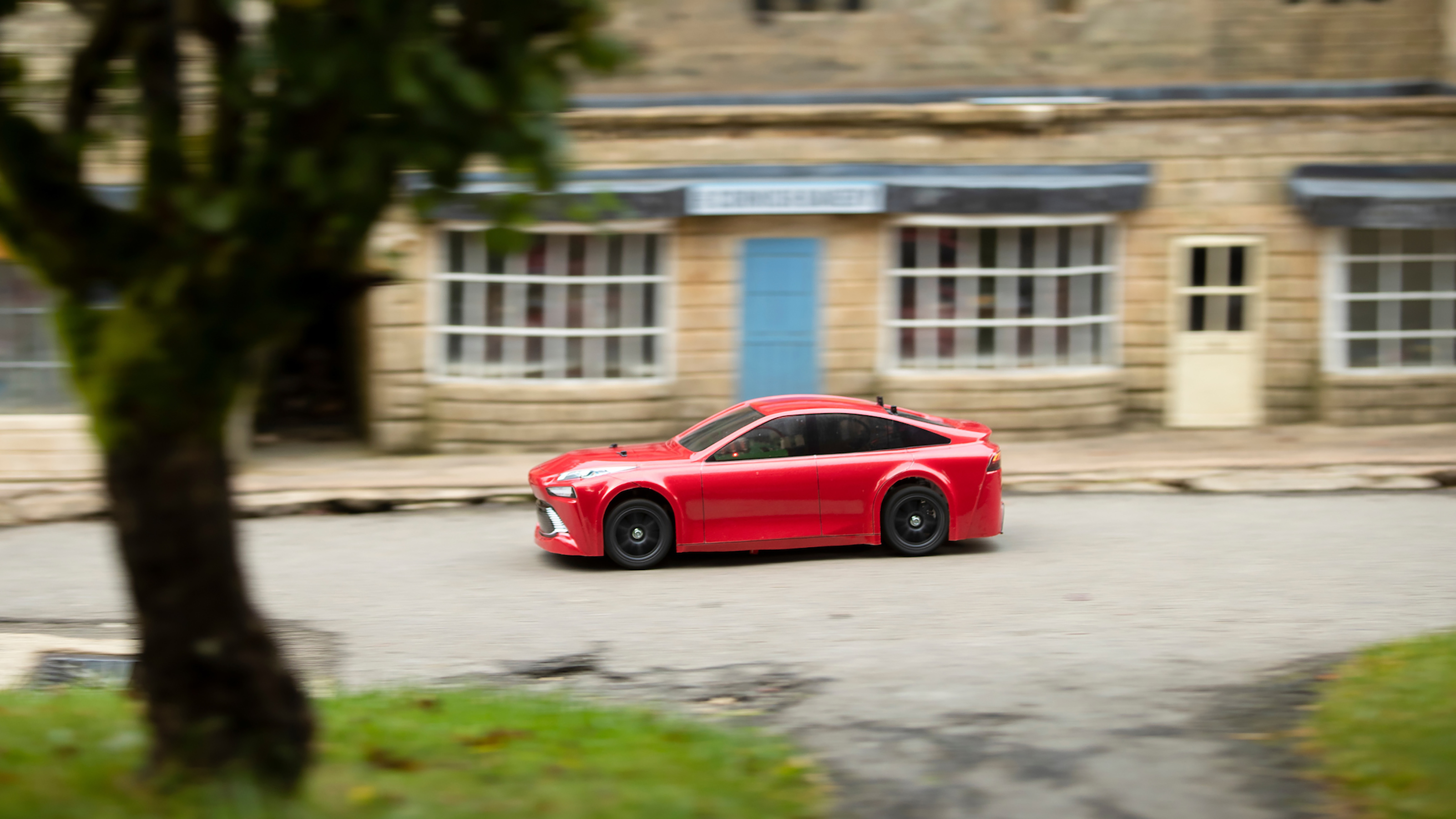 Toyota and Tamiya Mirai RC car - side