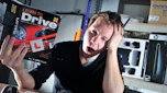 Tired man studying from driving theory test book