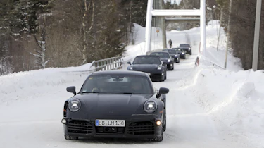 Convoy of 2023 Porsche 911 test cars