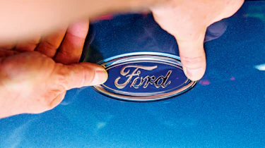 Ford badge being applied