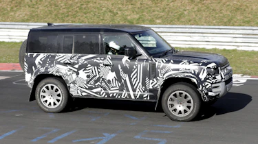 Land Rover Defender V8 spy shots side