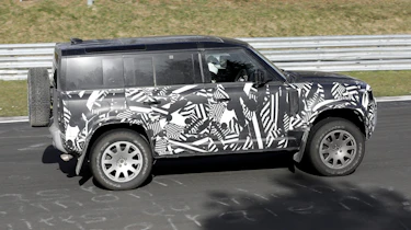 Land Rover Defender V8 spy shots side