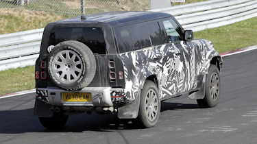 Land Rover Defender V8 spy shots rear 3/4