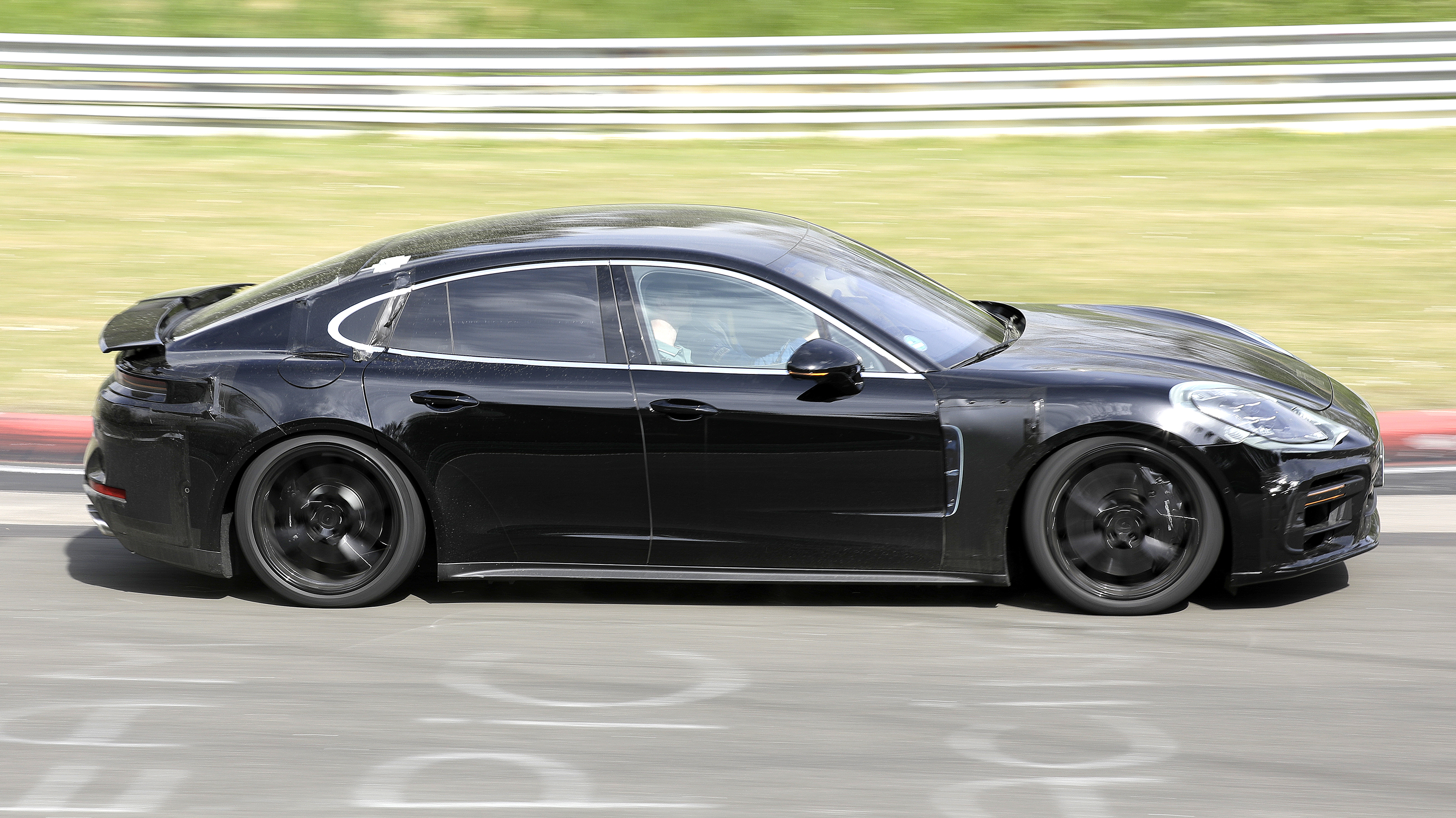2024 Porsche Panamera spyshot - side tracking