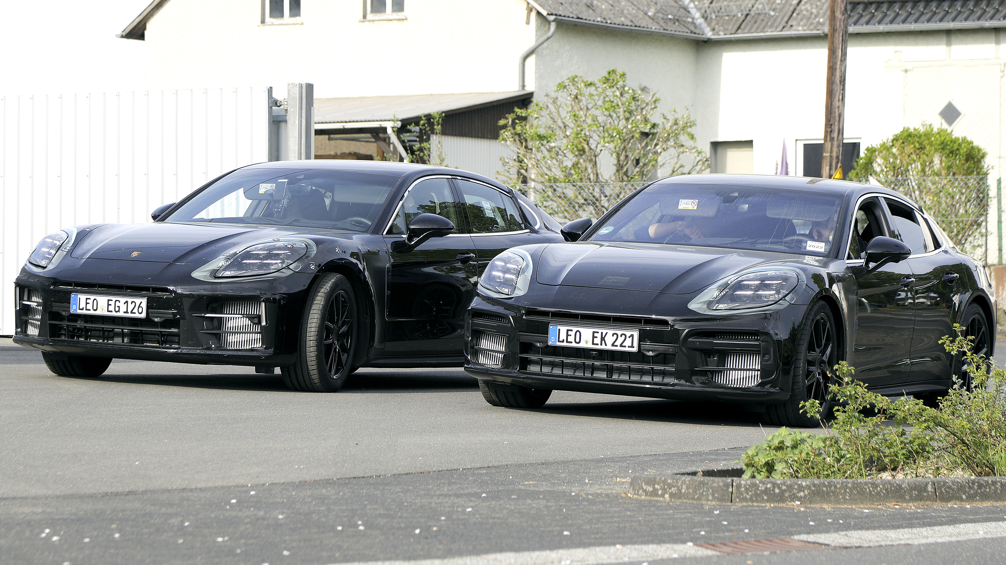 2024 Porsche Panamera spyshot - two models side by side front