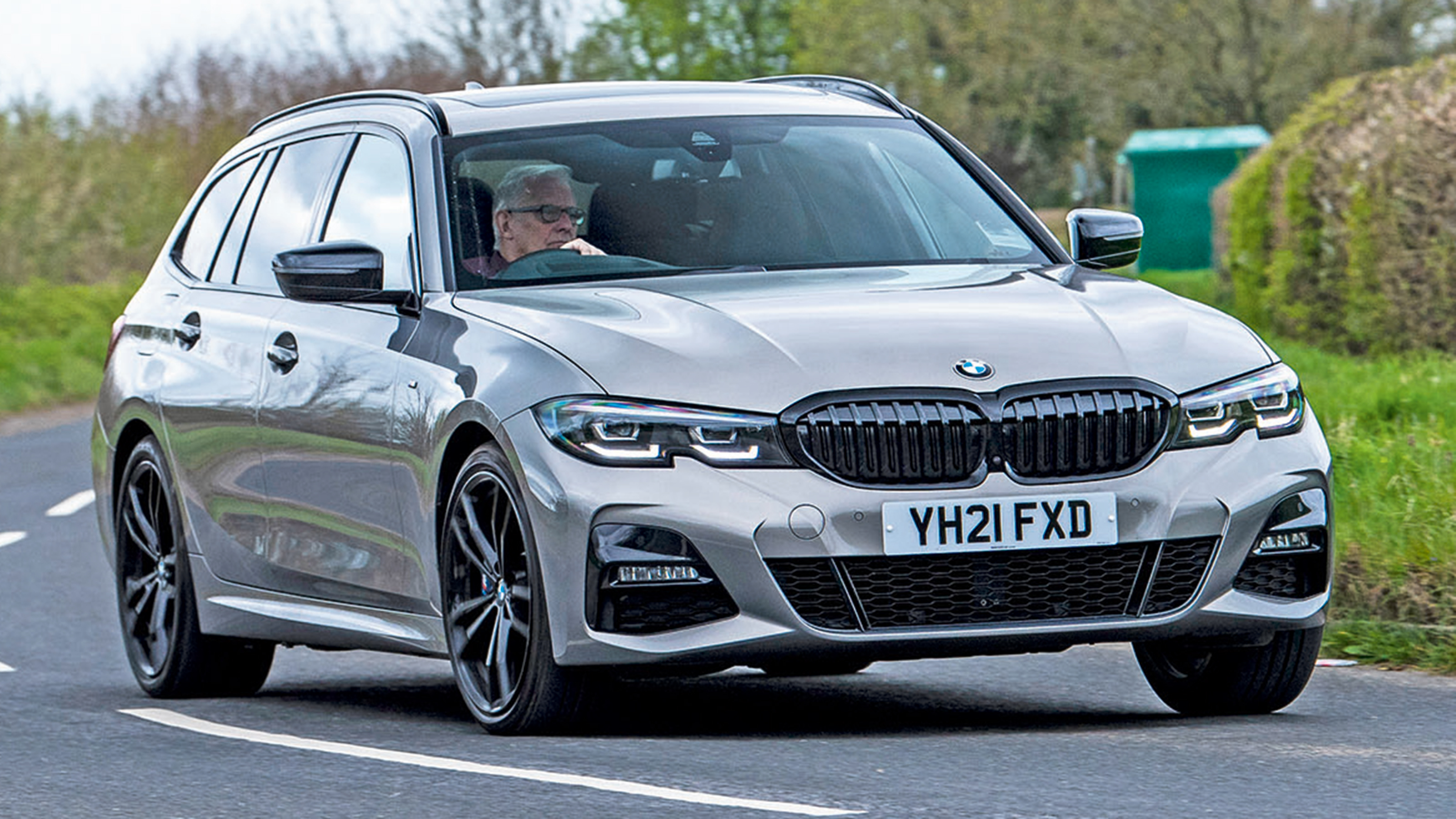 Peugeot 508 SW Sport Engineered vs BMW 330e xDrive Touring - 330e front cornering