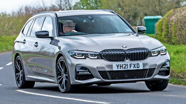 Peugeot 508 SW Sport Engineered vs BMW 330e xDrive Touring - 330e front cornering