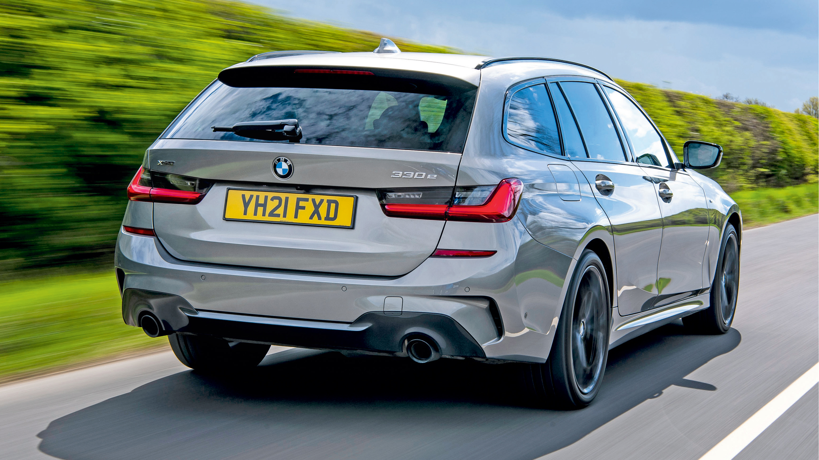 Peugeot 508 SW Sport Engineered vs BMW 330e xDrive Touring - 330e rear tracking