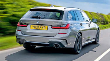Peugeot 508 SW Sport Engineered vs BMW 330e xDrive Touring - 330e rear tracking