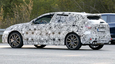 BMW 1 Series facelift spy - side action