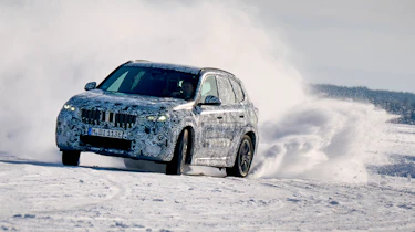 BMW iX1 winter testing - snow drifting front