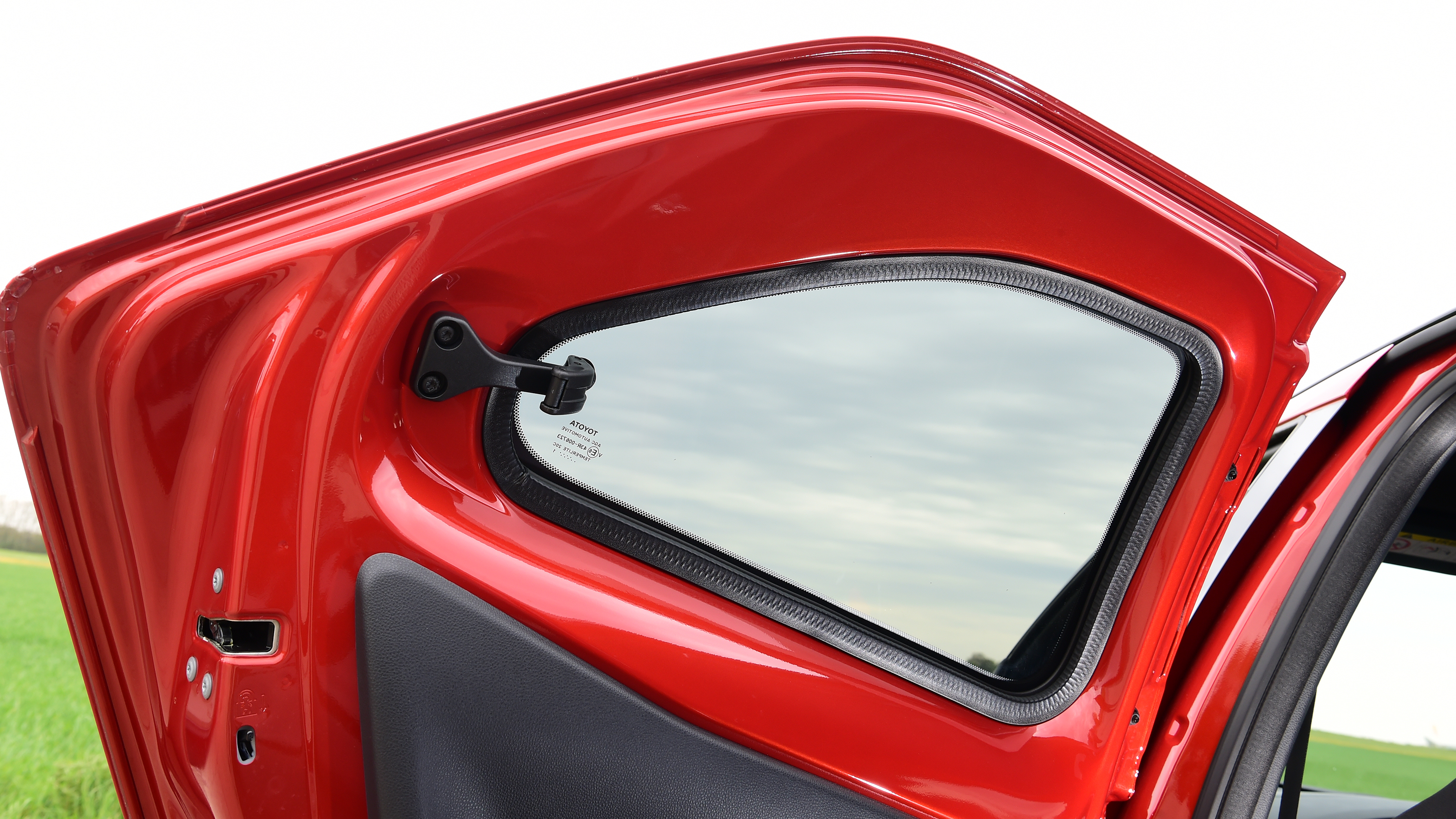 Toyota Aygo X vs Hyundai i10 vs Fiat 500 group test - Toyota Aygo X rear N/S door