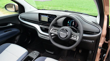 Toyota Aygo X vs Hyundai i10 vs Fiat 500 group test - Fiat 500 interior from driver's door