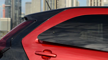 Toyota Aygo X vs Hyundai i10 vs Fiat 500 group test - Toyota Aygo X rear quarter