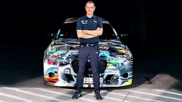 BMW M4 3.0 CSL - Frank van Meel stood in front of car