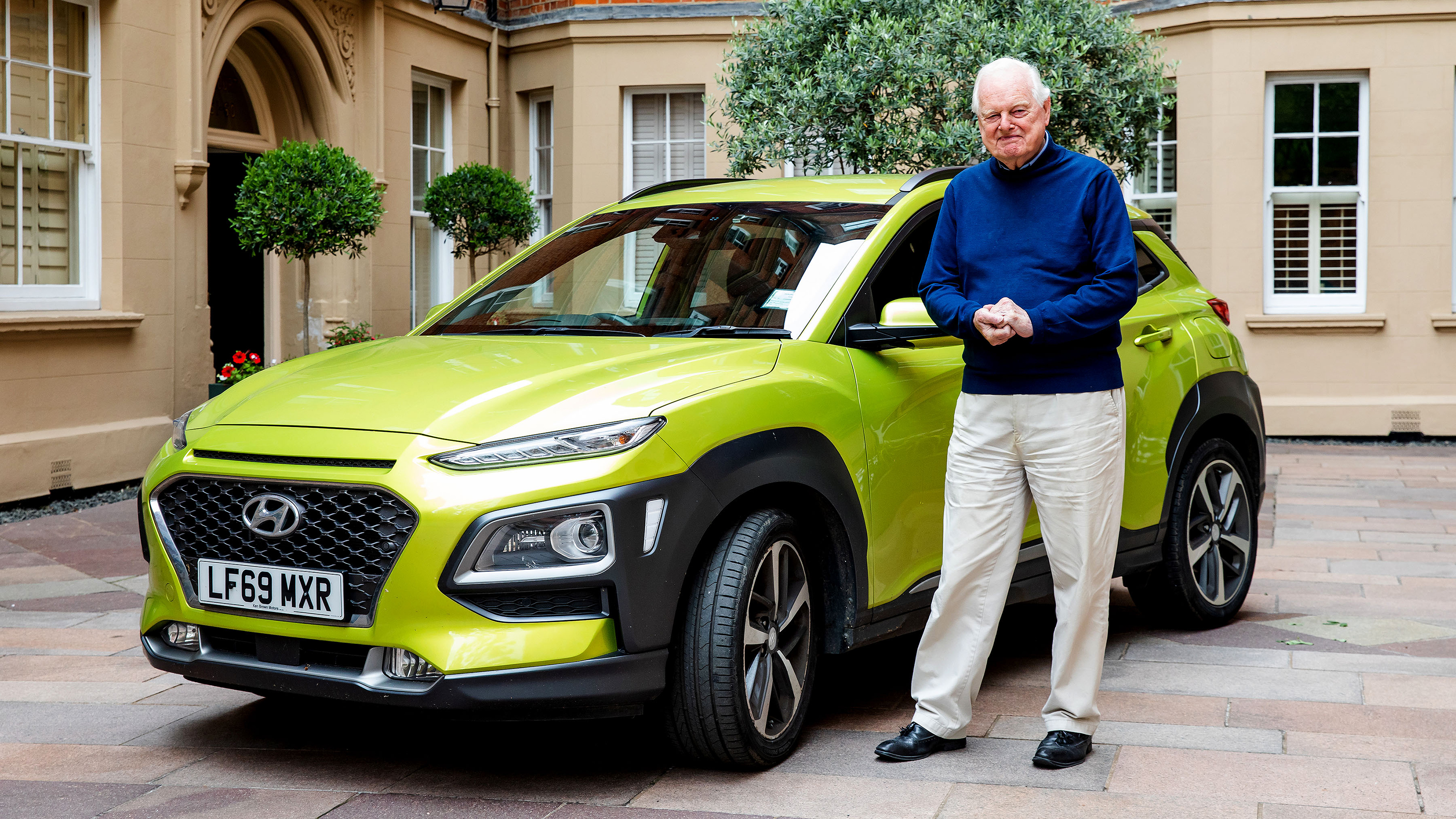 Owner Evan Llewellyn with their Hyundai Kona