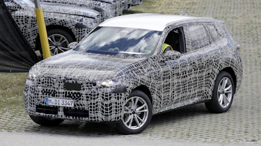 BMW X3 road testing - front/offside