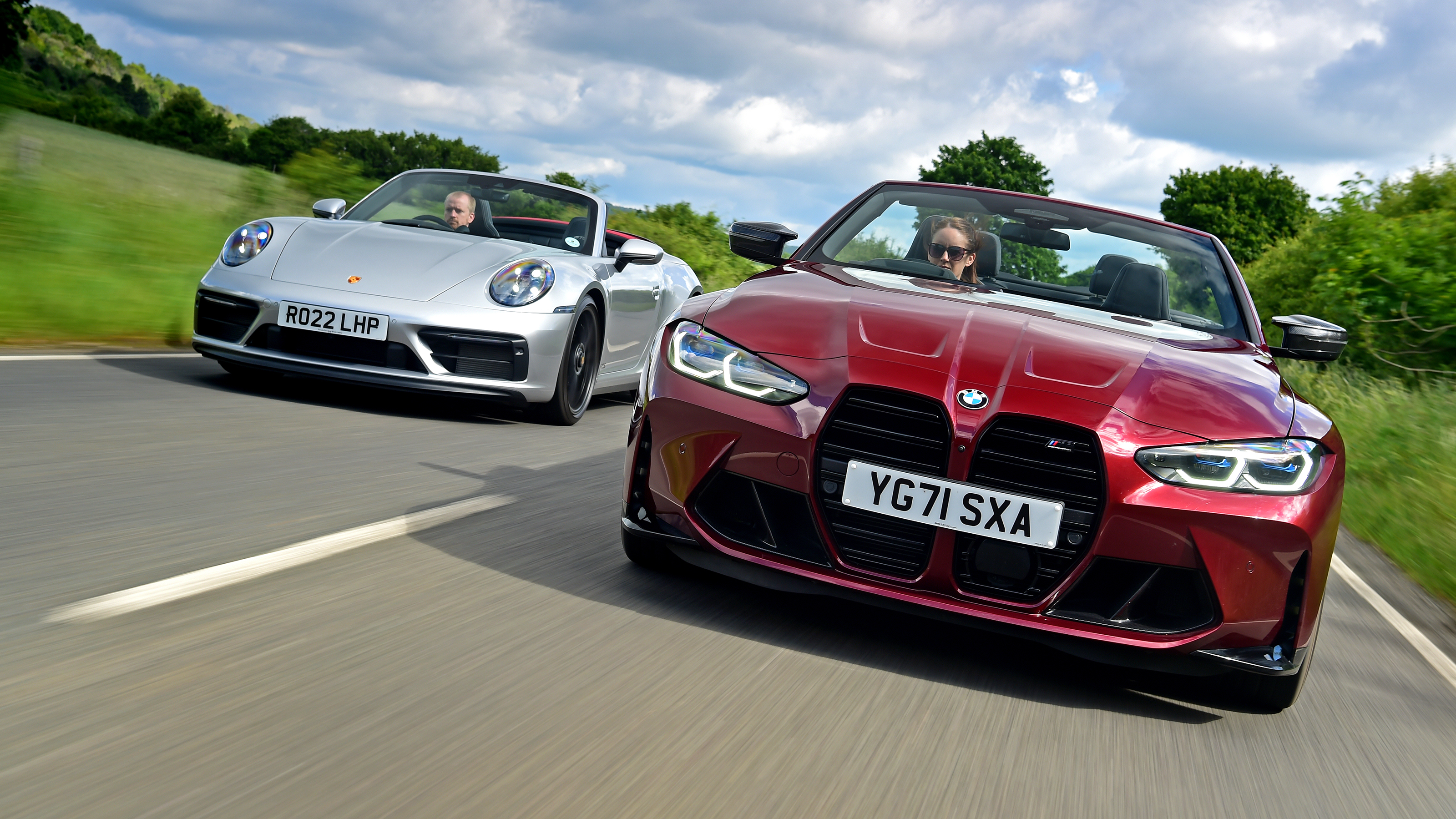 Porsche 911 Cabriolet and BMW M4 Convertible - side-by-side front tracking