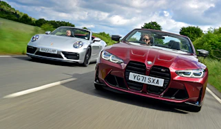 Porsche 911 Cabriolet and BMW M4 Convertible - side-by-side front tracking