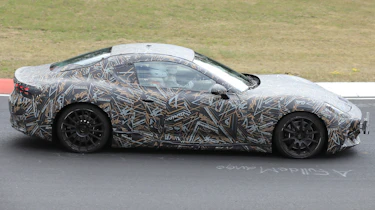 Maserati GranTurismo Folgore spyshot - side tracking