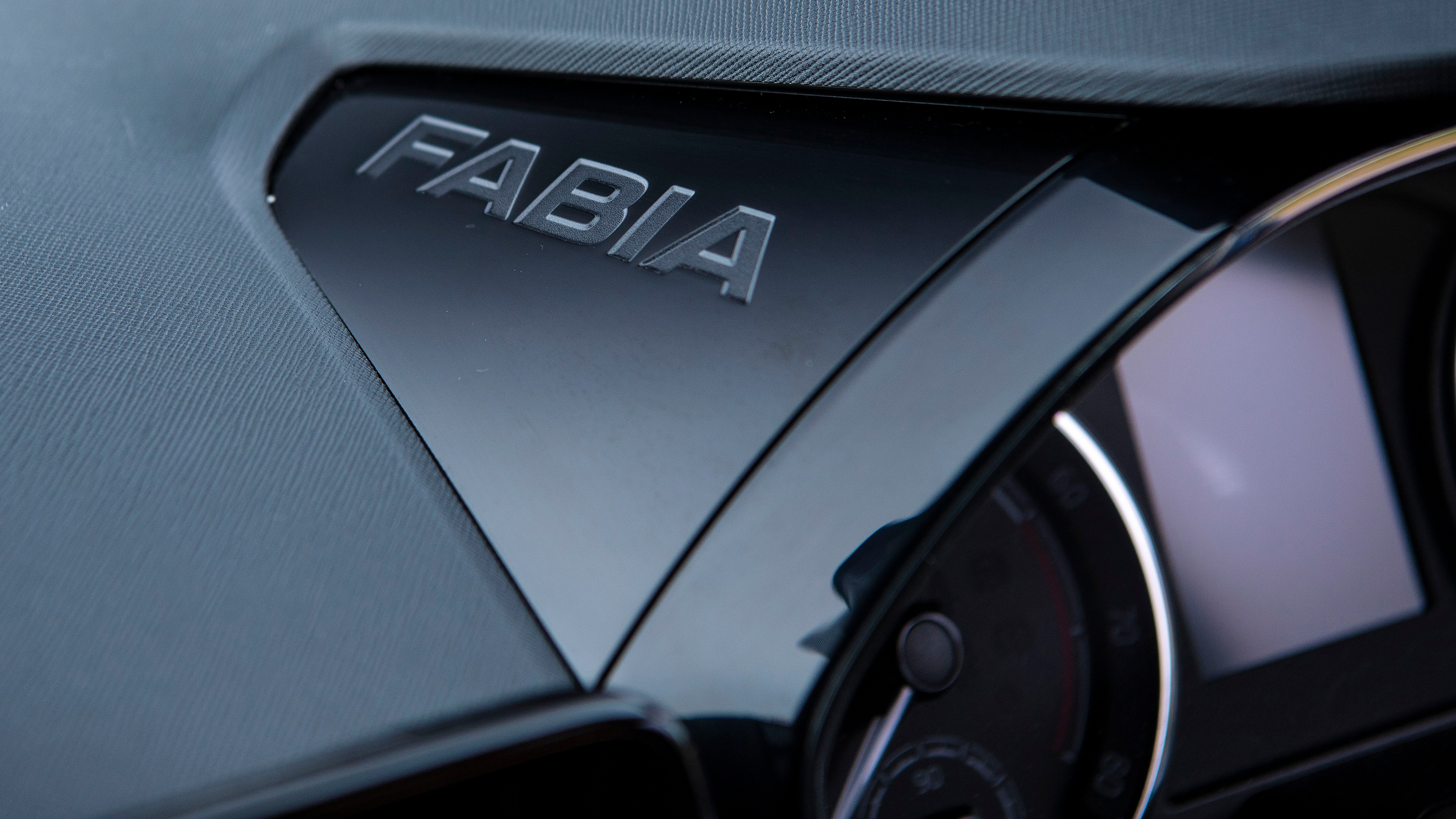 Skoda Fabia long termer - 'Fabia' embossed dashboard surround