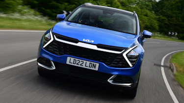Kia Sportage vs Hyundai Tucson - Kia Sportage front cornering