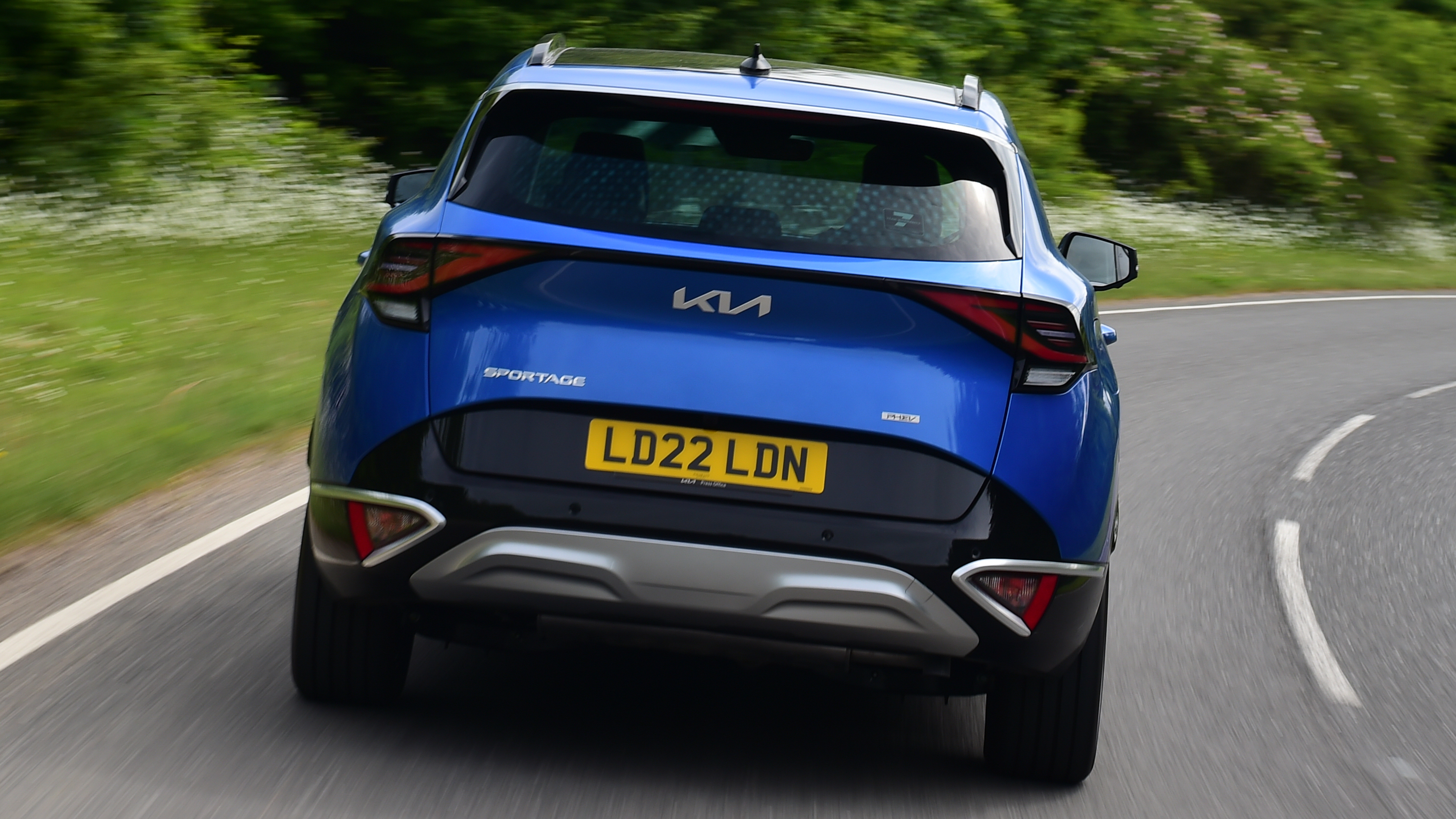 Kia Sportage vs Hyundai Tucson - Kia Sportage rear cornering