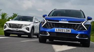Kia Sportage vs Hyundai Tucson - side-by-side action