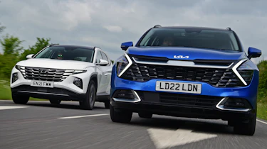 Kia Sportage vs Hyundai Tucson - side-by-side action